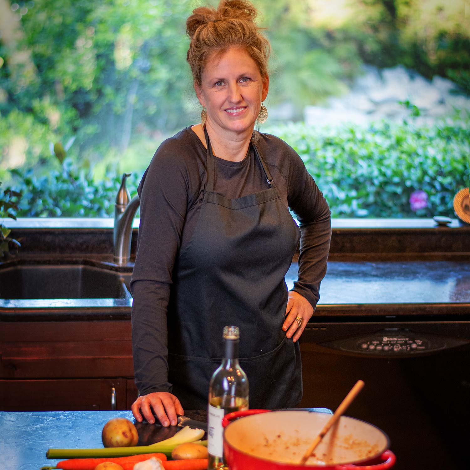 Marnie Coots smiling  in kitchen